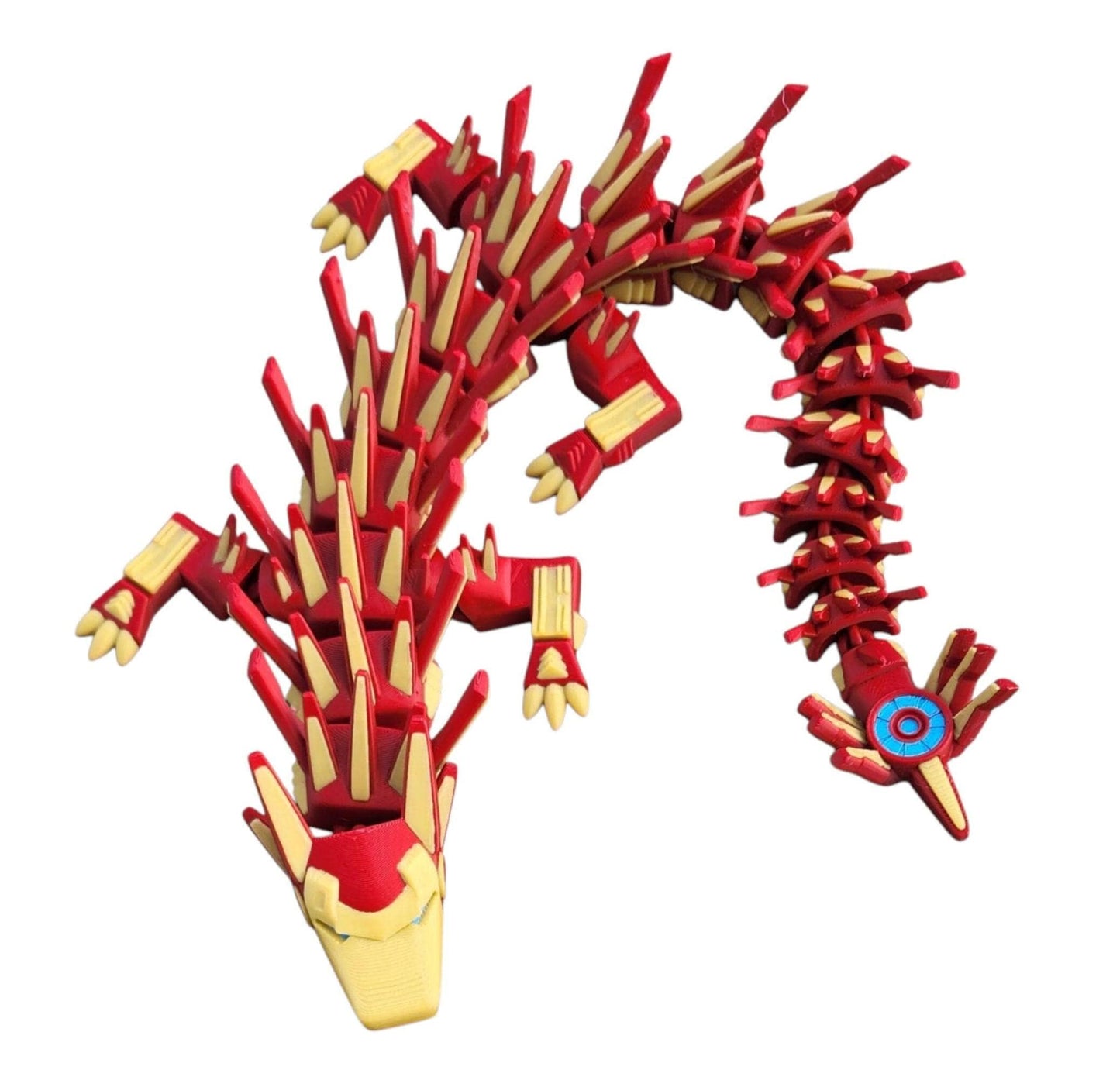 Red and gold legend inspired dragon action figures with articulated spine and clawed limbs on white background