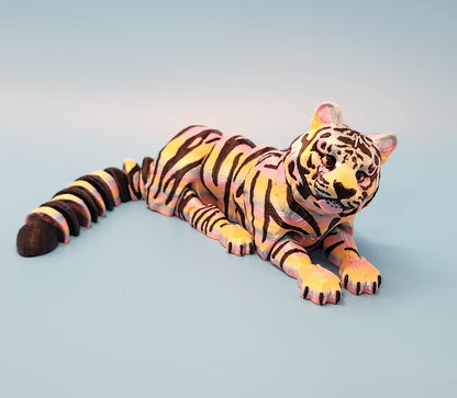 Toy tiger on a gradient blue background