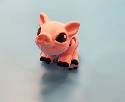 Pink pig-shaped object on a light blue background