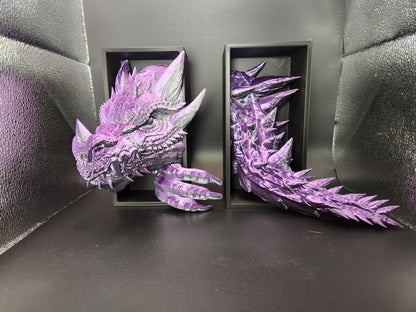 Purple 3D printed dragon bookend with detailed head and tail design on black background