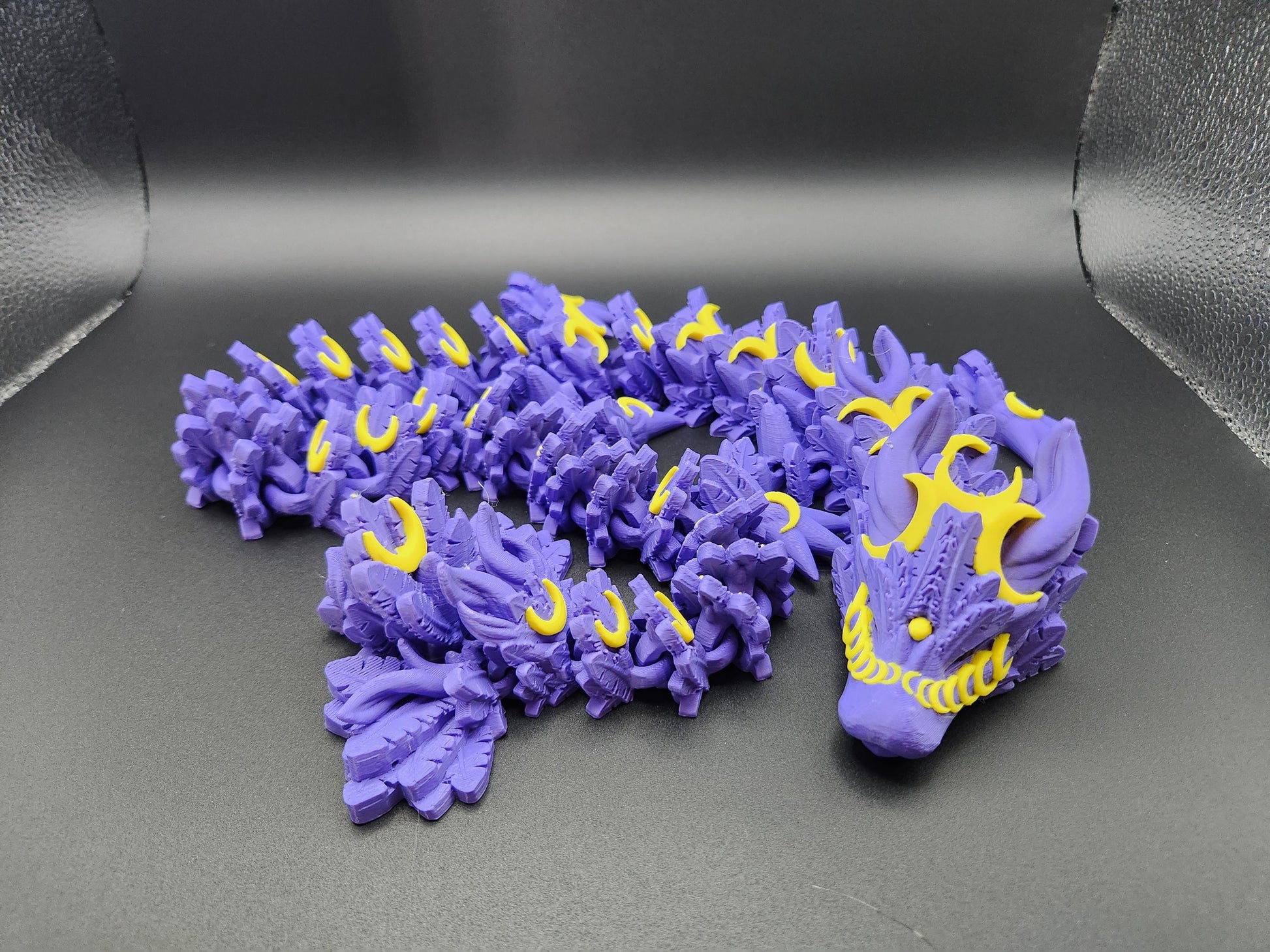 Etsy 3D printed lunar dragon figurine in purple and yellow with intricate details