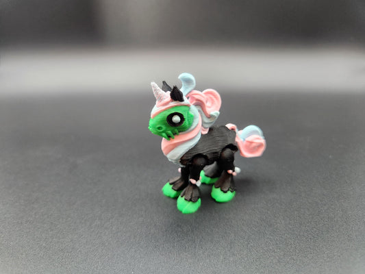 Crazy unicorn 3D print figure with green skull face and black body with pastel mane and tail