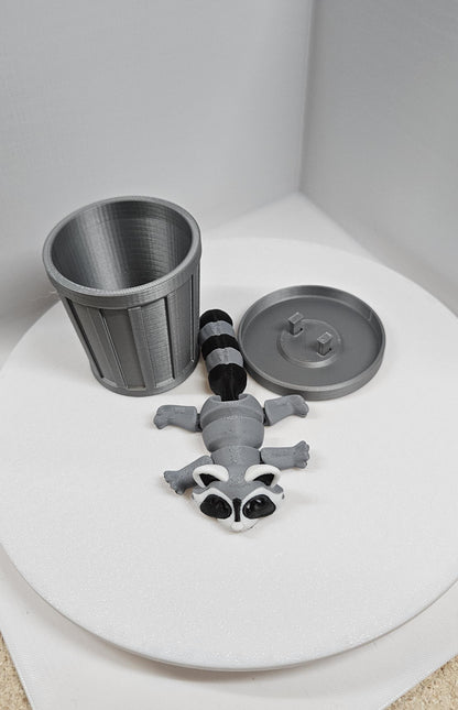 Articulated raccoon fidget figure with removable trash can and lid on white background