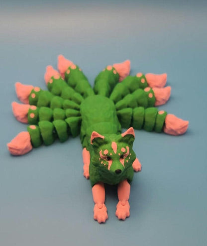 Green and pink Japanese kitsune figurine 9-tailed fox mythical creature with detailed tails and face