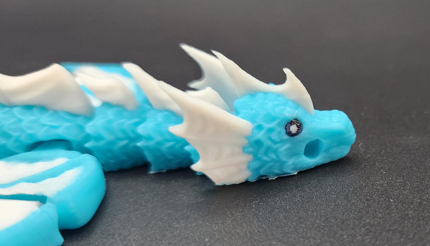 3D printed flexy articulated baby sea dragon keychain