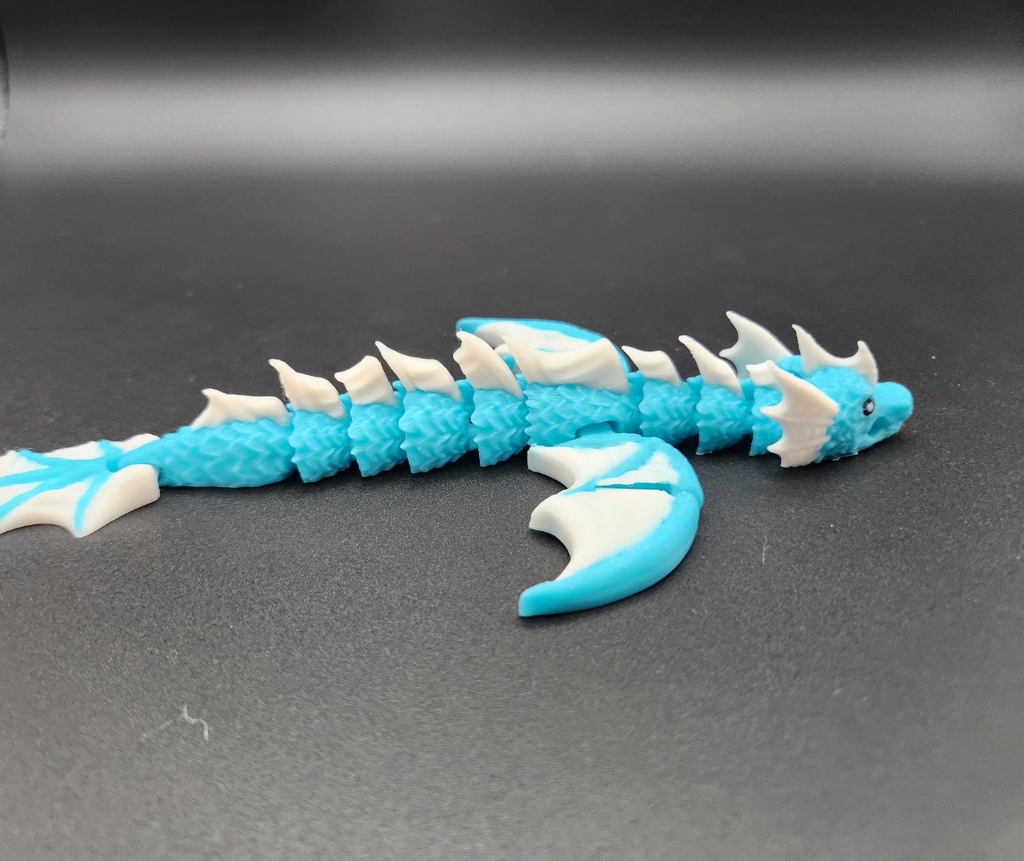 3D printed flexy articulated baby sea dragon keychain