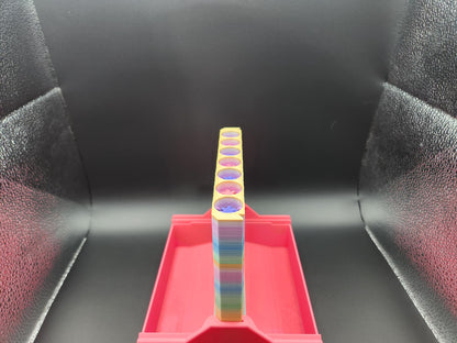 Colorful interactive 4-in-a-row game with red base and stacked circular pieces on Etsy