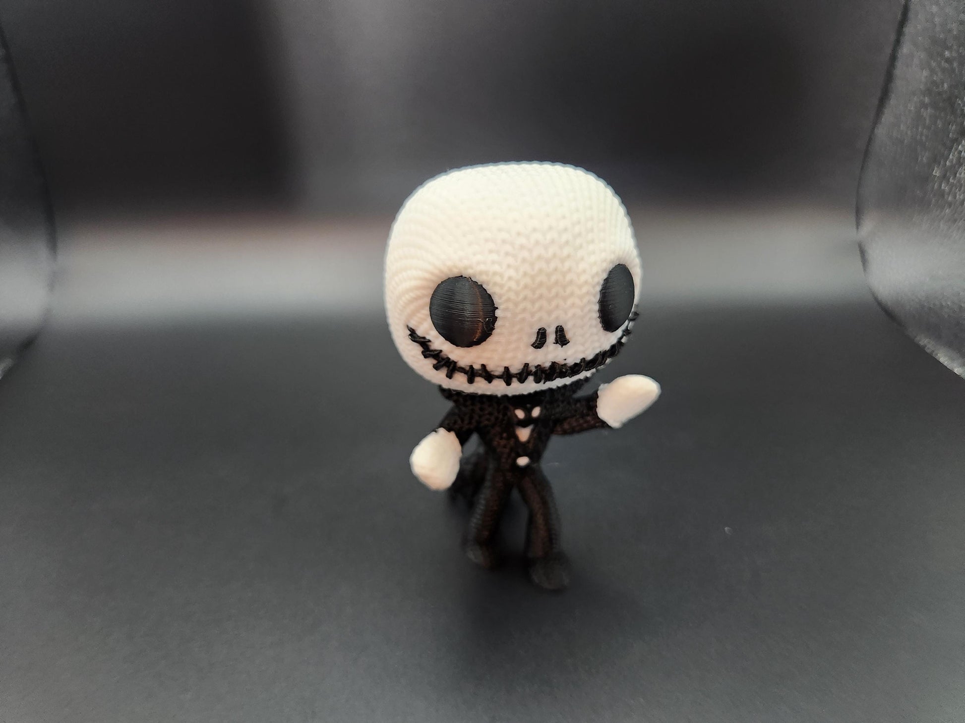 Unique crochet Nightmare Before Christmas gifts featuring handmade Jack Skellington amigurumi doll