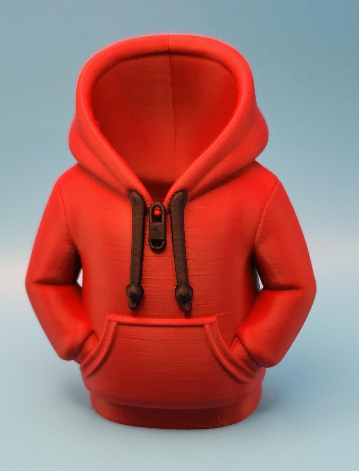 Red hoodie shaped novelty pencil cup for office with detailed zipper and pocket design