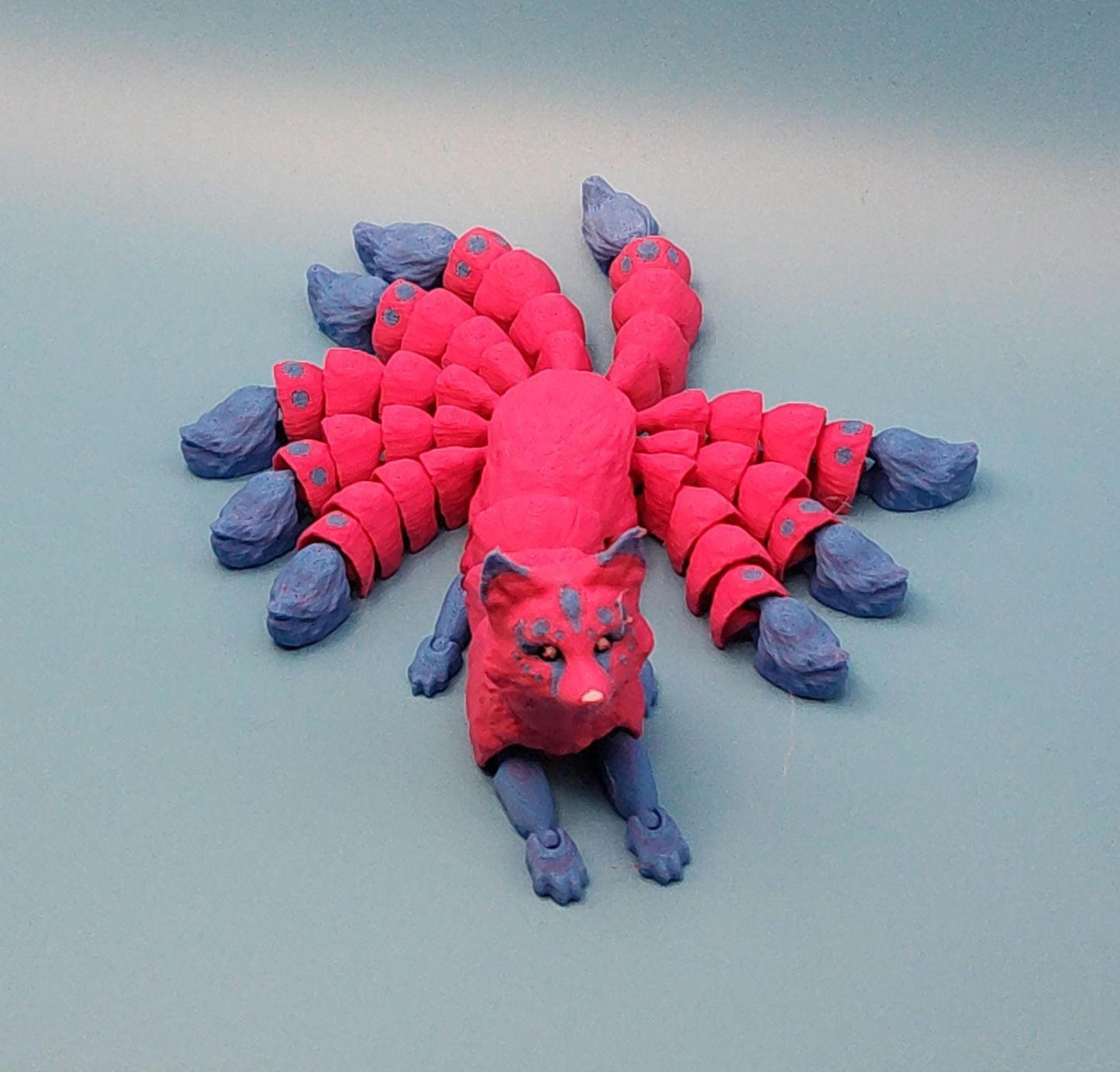 Handcrafted Japanese kitsune figurine 9-tailed fox mythical creature in bright pink and purple colors