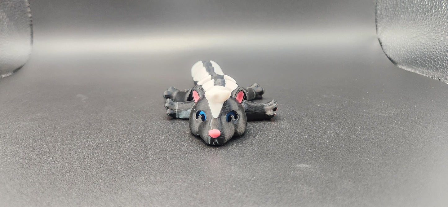Realistic articulated Skunk Fidget toy with detailed black and white design and movable limbs