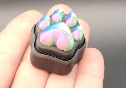 Colorful paw-shaped sensory stress relief clicker for anxiety and fidgeting