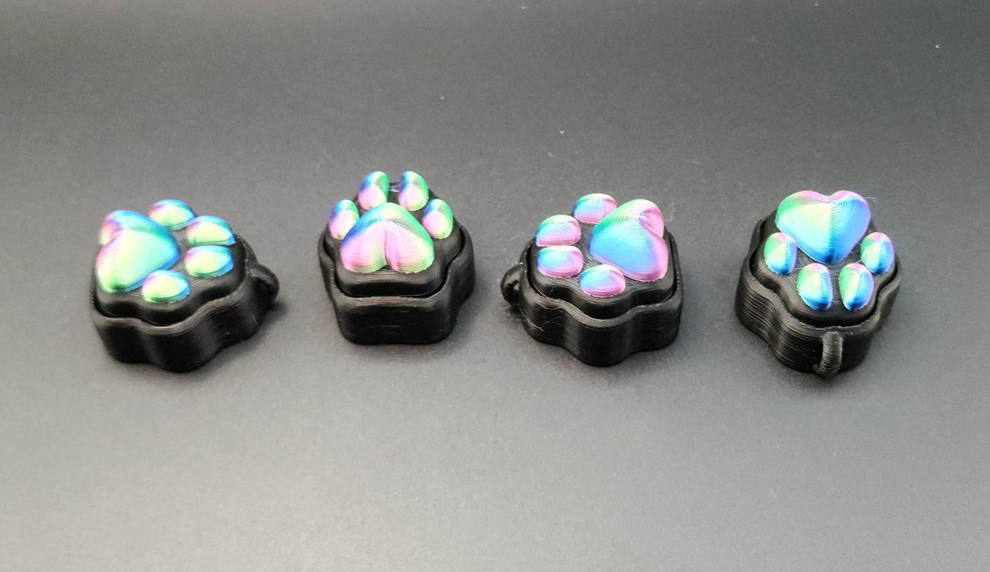  sensory stress relief clicker toys with colorful iridescent paw and heart designs