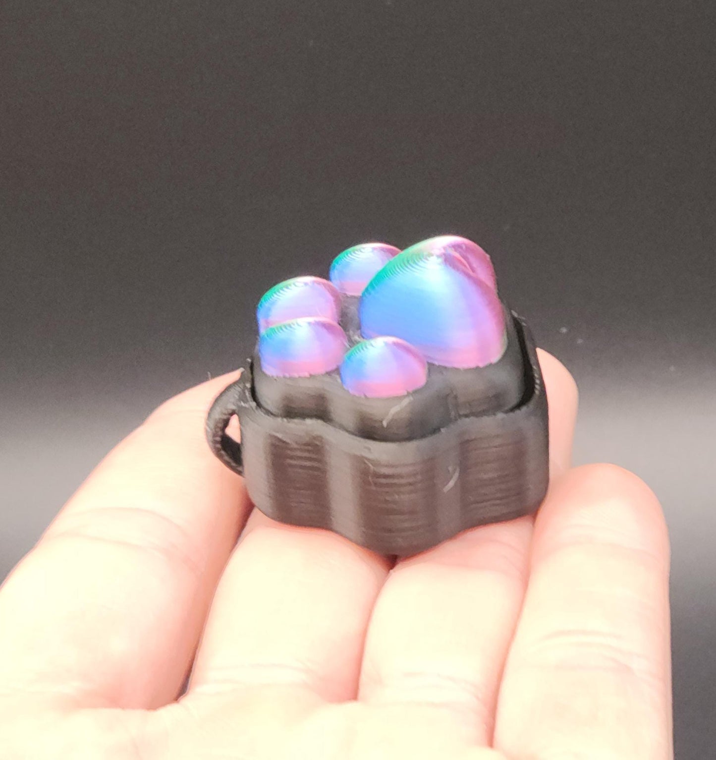 sensory stress relief clicker with iridescent bubble buttons