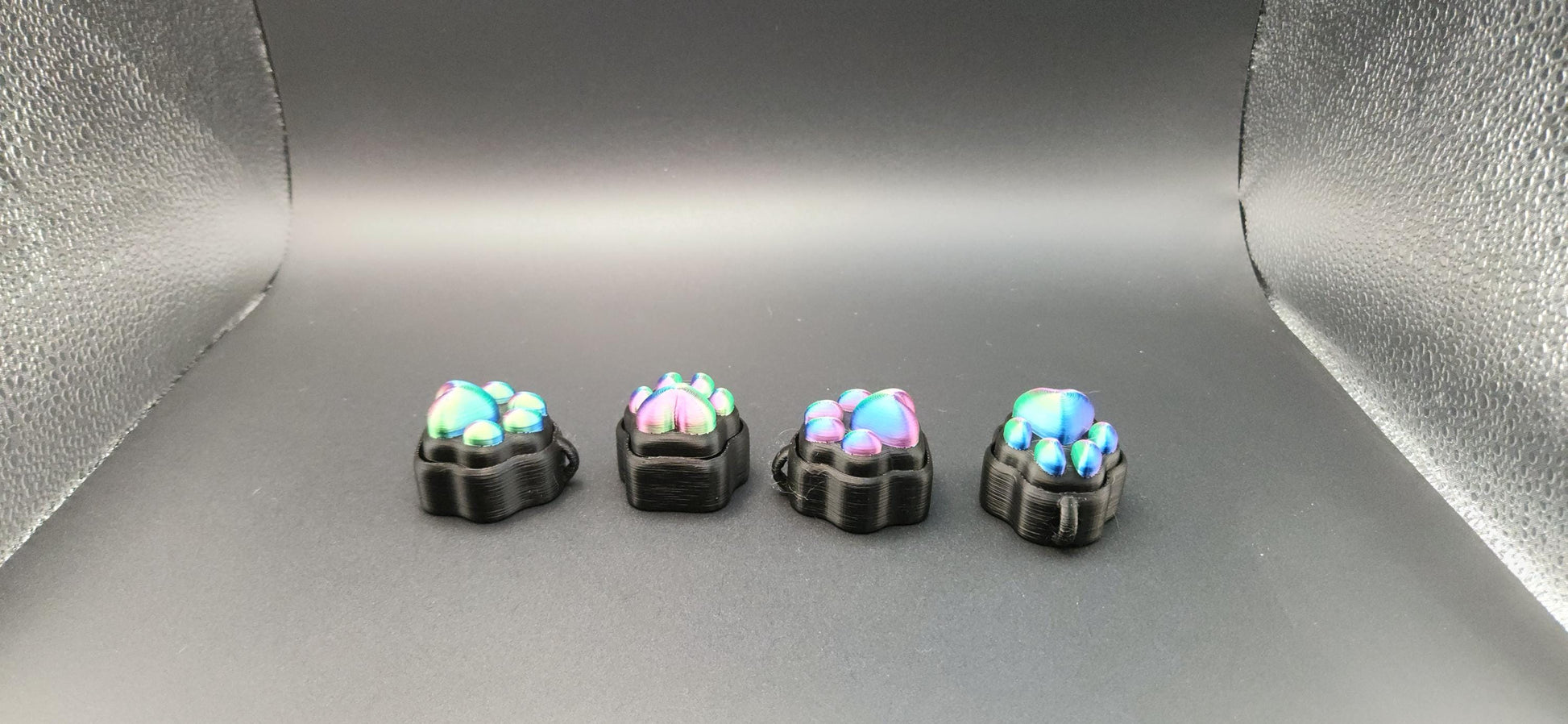 small black sensory stress relief clicker toys with colorful silicone bubbles on top