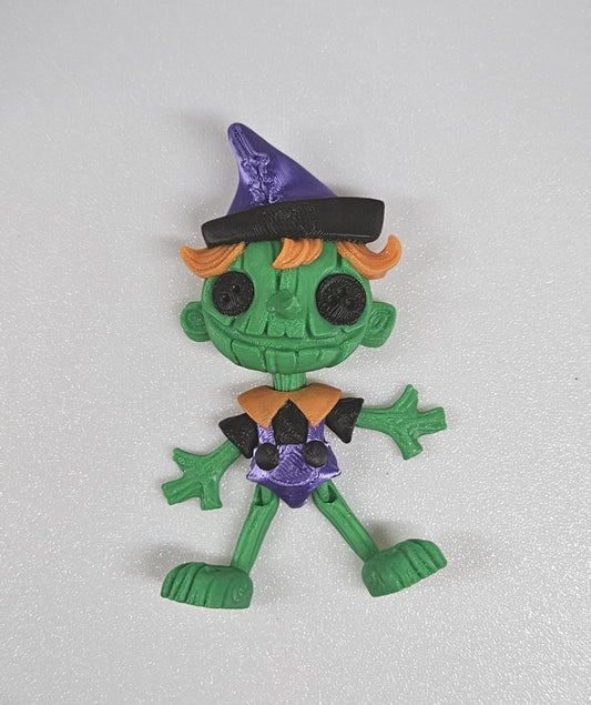 Spooky articulated dolls pinnocchio themed green witch doll with purple hat and orange hair
