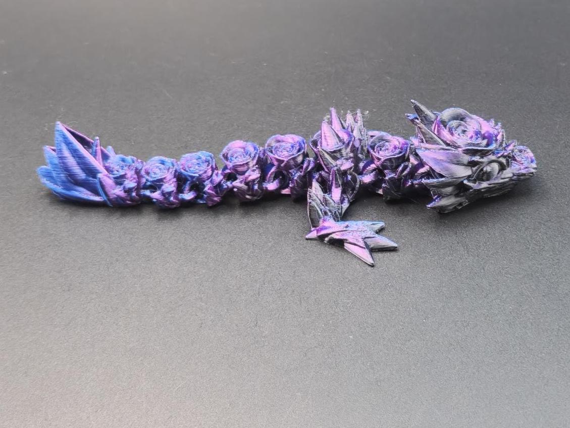 Etsy 3D printed baby dragon model in purple and blue with detailed scales and wings