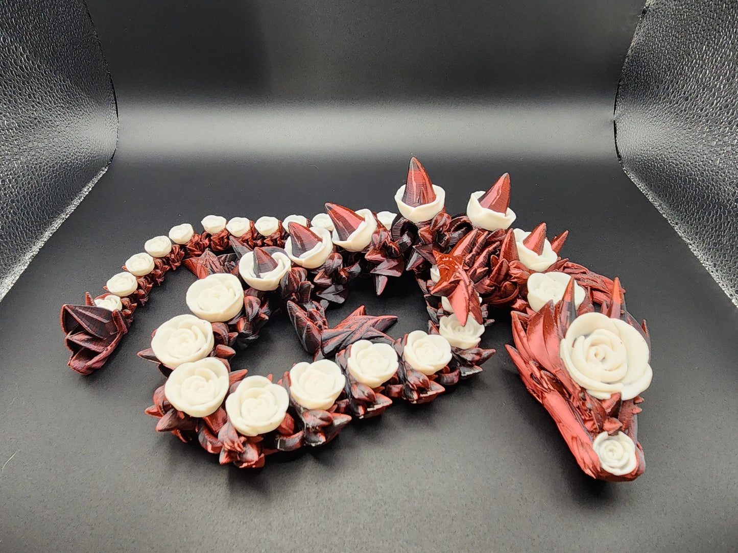 3D printed rose dragon figurine in red and white with intricate floral and spike details