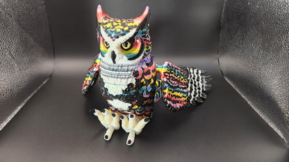 Colorful poseable articulated rainbow great horned owl figurine with detailed feathers