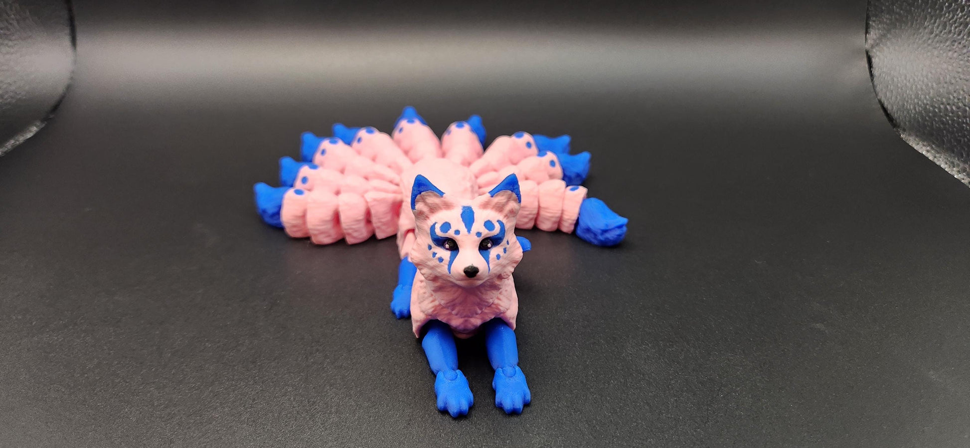 Pink and blue Japanese kitsune figurine 9-tailed fox mythical creature with detailed facial markings