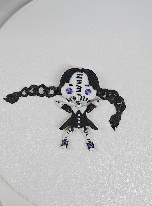 Handcrafted Wednesday articulated doll with black braided hair and purple eyes in gothic outfit